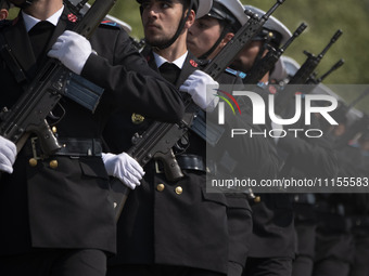 Members of the Iranian navy are marching in a military parade to mark the anniversary of Iran's Army Day at an Army military base in Tehran,...