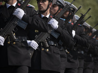 Members of the Iranian navy are marching in a military parade to mark the anniversary of Iran's Army Day at an Army military base in Tehran,...