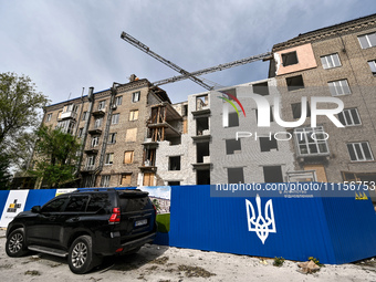 A residential building at 80 Nezalezhnoi Ukrainy Street/3 Yakova Novytskoho Street is undergoing reconstruction after being destroyed by Rus...