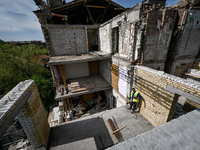 A residential building at 80 Nezalezhnoi Ukrainy Street/3 Yakova Novytskoho Street is undergoing reconstruction after being destroyed by Rus...