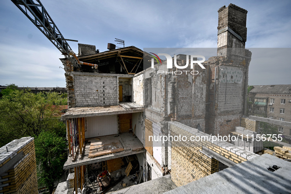 A residential building at 80 Nezalezhnoi Ukrainy Street/3 Yakova Novytskoho Street is undergoing reconstruction after being destroyed by Rus...