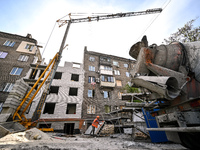 A residential building at 80 Nezalezhnoi Ukrainy Street/3 Yakova Novytskoho Street is undergoing reconstruction after being destroyed by Rus...