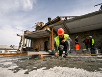 A residential building at 80 Nezalezhnoi Ukrainy Street/3 Yakova Novytskoho Street is undergoing reconstruction after being destroyed by Rus...