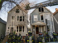 The Chicago Fire Department is battling a significant 2-11 alarm blaze at 2837 North Christiana Avenue in Chicago, Illinois, on April 19, 20...