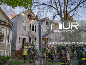 The Chicago Fire Department is battling a significant 2-11 alarm blaze at 2837 North Christiana Avenue in Chicago, Illinois, on April 19, 20...