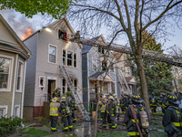 The Chicago Fire Department is battling a significant 2-11 alarm blaze at 2837 North Christiana Avenue in Chicago, Illinois, on April 19, 20...