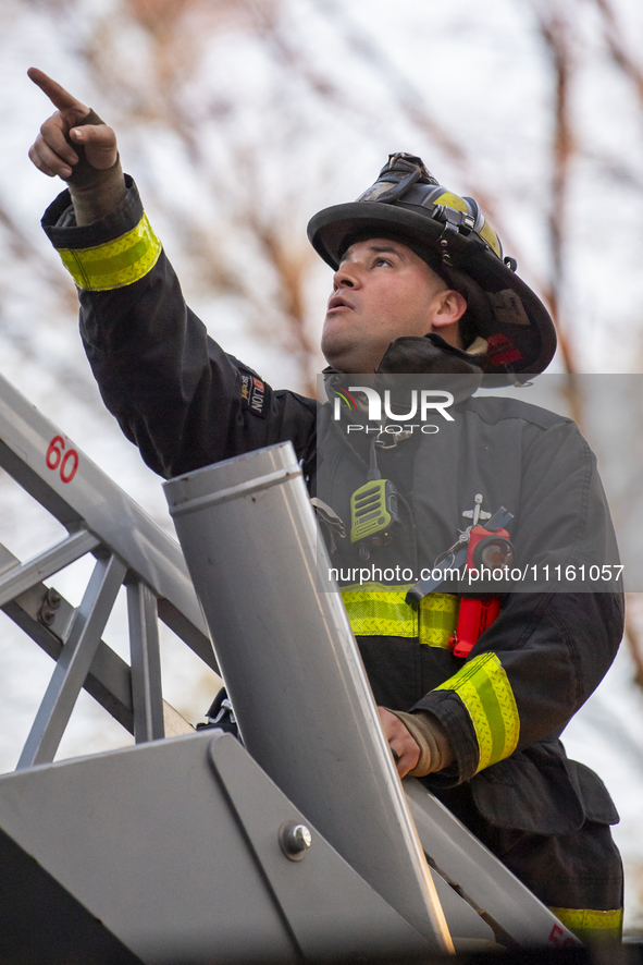  The Chicago Fire Department is battling a significant 2-11 alarm blaze at 2837 North Christiana Avenue in Chicago, Illinois, on April 19, 2...