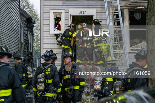  	The Chicago Fire Department is battling a significant 2-11 alarm blaze at 2837 North Christiana Avenue in Chicago, Illinois, on April 19,...