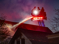 The Chicago Fire Department is battling a significant 2-11 alarm blaze at 2837 North Christiana Avenue in Chicago, Illinois, on April 19, 20...