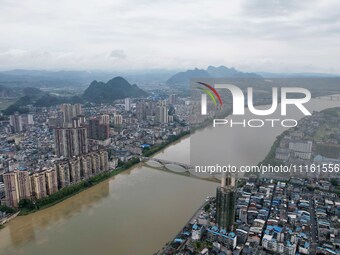 The water level of the Rongan county section of the Rongjiang River in the upper reaches of the Pearl River is rising in Liuzhou, China, on...