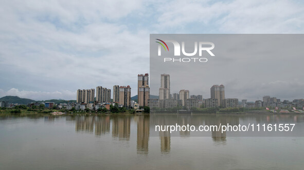 The water level of the Rongan county section of the Rongjiang River in the upper reaches of the Pearl River is rising in Liuzhou, China, on...