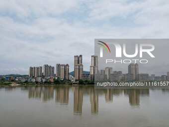 The water level of the Rongan county section of the Rongjiang River in the upper reaches of the Pearl River is rising in Liuzhou, China, on...