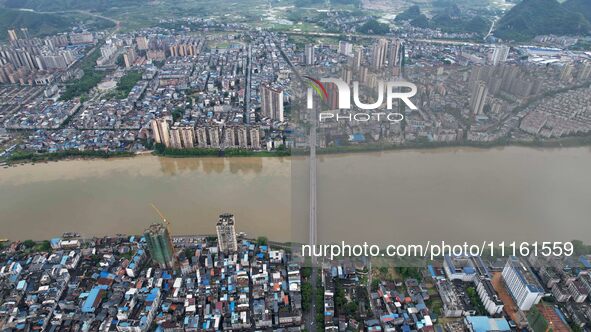 The water level of the Rongan county section of the Rongjiang River in the upper reaches of the Pearl River is rising in Liuzhou, China, on...