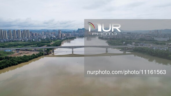 The water level of the Rongan county section of the Rongjiang River in the upper reaches of the Pearl River is rising in Liuzhou, China, on...