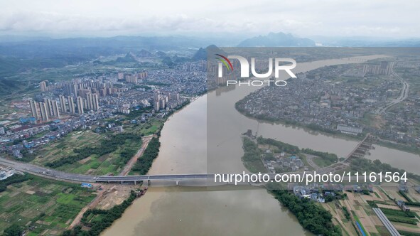 The water level of the Rongan county section of the Rongjiang River in the upper reaches of the Pearl River is rising in Liuzhou, China, on...