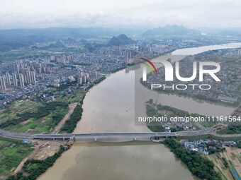 The water level of the Rongan county section of the Rongjiang River in the upper reaches of the Pearl River is rising in Liuzhou, China, on...