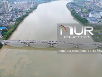 The water level of the Rongan county section of the Rongjiang River in the upper reaches of the Pearl River is rising in Liuzhou, China, on...