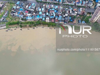 The water level of the Rongan county section of the Rongjiang River in the upper reaches of the Pearl River is rising in Liuzhou, China, on...