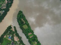 The water level of the Rongan county section of the Rongjiang River in the upper reaches of the Pearl River is rising in Liuzhou, China, on...