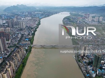 The water level of the Rongan county section of the Rongjiang River in the upper reaches of the Pearl River is rising in Liuzhou, China, on...