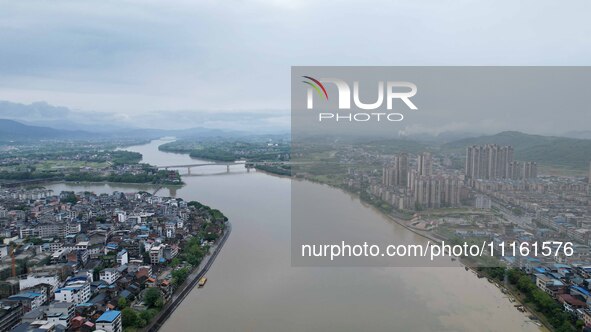 The water level of the Rongan county section of the Rongjiang River in the upper reaches of the Pearl River is rising in Liuzhou, China, on...