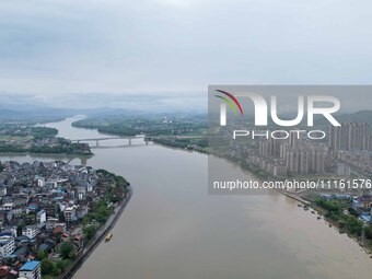 The water level of the Rongan county section of the Rongjiang River in the upper reaches of the Pearl River is rising in Liuzhou, China, on...