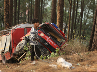 Nepali officials are fixing chains to extract the remains of a firefighting engine that crashed while it was being deployed to douse a fores...