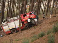 Nepali officials are scouring through the remains of a crashed firefighting engine that crashed while being deployed to douse a forest fire...