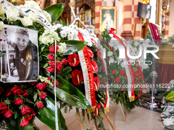 Flowers and coffin is seen during a funeral of Damian Sobol, a volunteer for World Central Kitchen, who was killed in an Israeli attack on G...