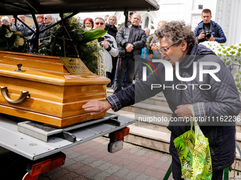 Family and friends attend a funeral of Damian Sobol, a volunteer for World Central Kitchen, who was killed in an Israeli attack on Gaza Stri...