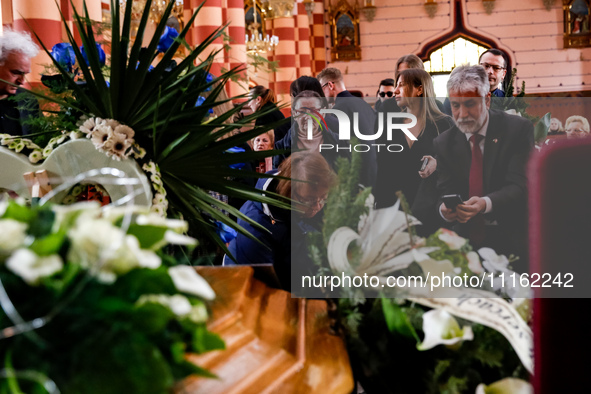 (L-R) Mother, fiancee and Palestinian ambassador to Poland Mahmoud Khalifa attend a funeral of Damian Sobol, a volunteer for World Central K...