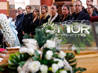 Family and friends attend a funeral of Damian Sobol, a volunteer for World Central Kitchen, who was killed in an Israeli attack on Gaza Stri...