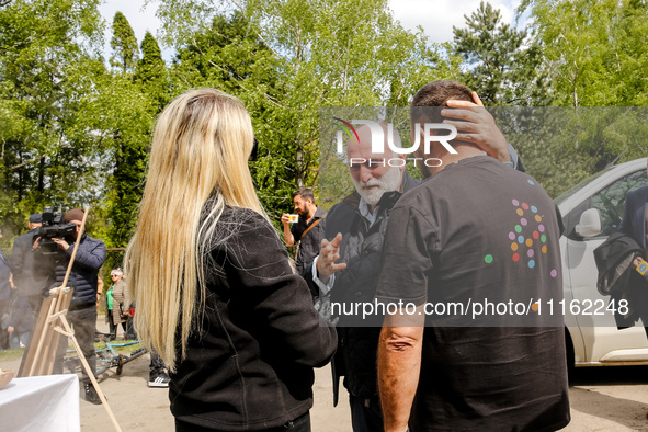 José Andrés, a funder of World Central Kitchen greets with WCK volunteers after the funeral of Damian Sobol, a volunteer for World Central K...