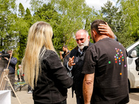 José Andrés, a funder of World Central Kitchen greets with WCK volunteers after the funeral of Damian Sobol, a volunteer for World Central K...