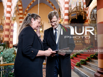 Mother of Damian Sobol, Alicja Houthuijzen-Sobol receives a post-mortum medal from the representative of the President of Polan, Andrzej Dud...