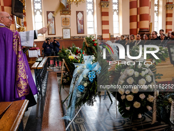 Family and friends attend a funeral of Damian Sobol, a volunteer for World Central Kitchen, who was killed in an Israeli attack on Gaza Stri...