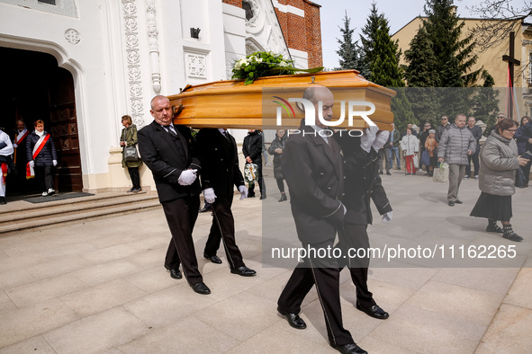 A coffin is carried during a funeral of Damian Sobol, a volunteer for World Central Kitchen, who was killed in an Israeli attack on Gaza Str...