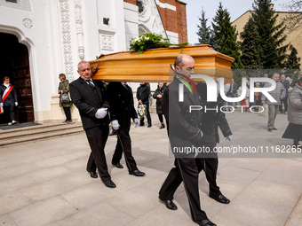 A coffin is carried during a funeral of Damian Sobol, a volunteer for World Central Kitchen, who was killed in an Israeli attack on Gaza Str...