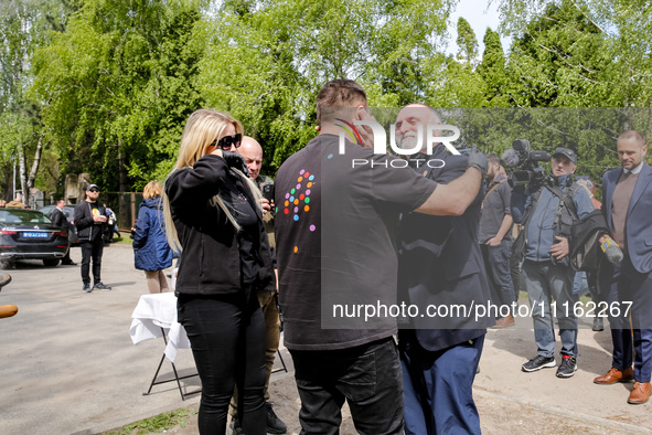 José Andrés, a funder of World Central Kitchen greets with WCK volunteers after the funeral of Damian Sobol, a volunteer for World Central K...