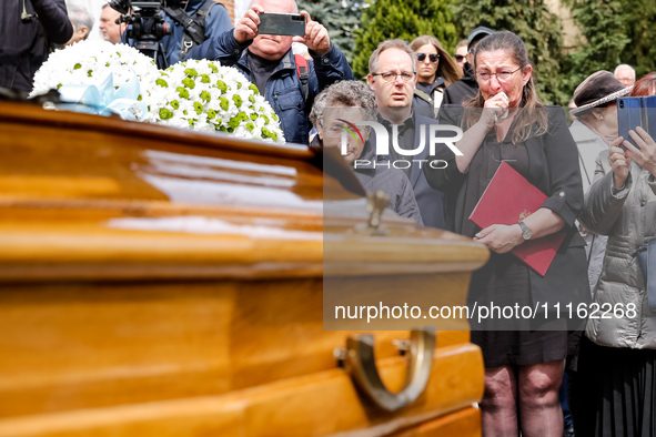 Mother shows her emotions during a funeral of Damian Sobol, a volunteer for World Central Kitchen, who was killed in an Israeli attack on Ga...