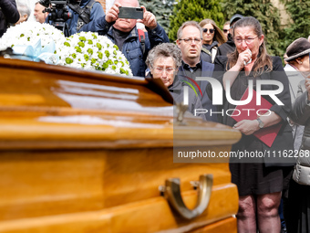 Mother shows her emotions during a funeral of Damian Sobol, a volunteer for World Central Kitchen, who was killed in an Israeli attack on Ga...