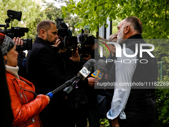 José Andrés, a funder of World Central Kitchen gives an interview after the funeral of Damian Sobol, a volunteer for World Central Kitchen,...