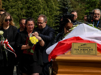 Mother and family show their emotions during a funeral on cemetery of Damian Sobol, a volunteer for World Central Kitchen, who was killed in...