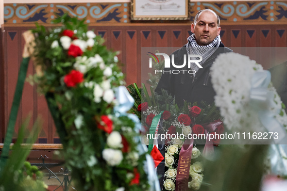 A Plestinian activist attends a funeral of Damian Sobol, a volunteer for World Central Kitchen, who was killed in an Israeli attack on Gaza...