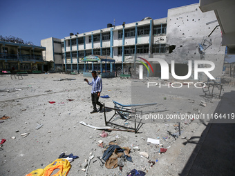 An UNRWA-run school is lying in ruins during the ongoing conflict between Israel and the Palestinian Islamist group Hamas, in Nuseirat, cent...