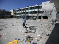 An UNRWA-run school is lying in ruins during the ongoing conflict between Israel and the Palestinian Islamist group Hamas, in Nuseirat, cent...