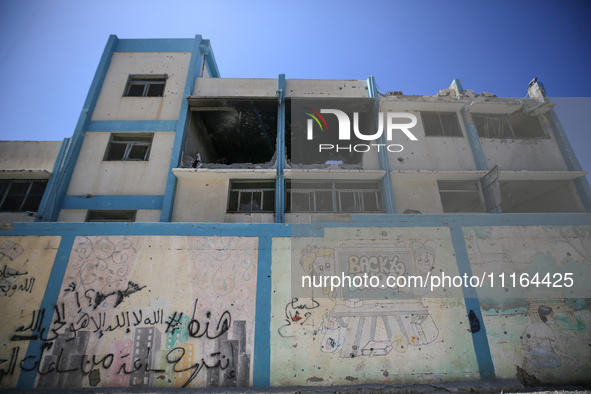 An UNRWA-run school is lying in ruins during the ongoing conflict between Israel and the Palestinian Islamist group Hamas, in Nuseirat, cent...