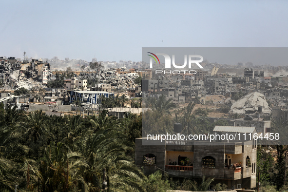 A general view is showing the rubble of destroyed buildings in Al-Zahra on the southern outskirts of Gaza City, on April 21, 2024, amid ongo...