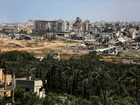 A general view is showing the rubble of destroyed buildings in Al-Zahra on the southern outskirts of Gaza City, on April 21, 2024, amid ongo...