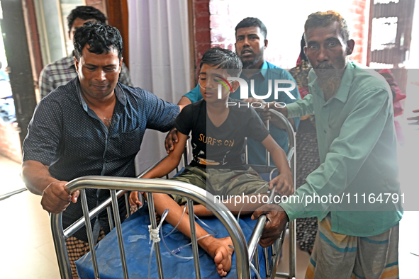 A child is receiving medical treatment for pneumonia at Dhaka Child Hospital amid an ongoing heatwave in Dhaka, Bangladesh, on April 21, 202...